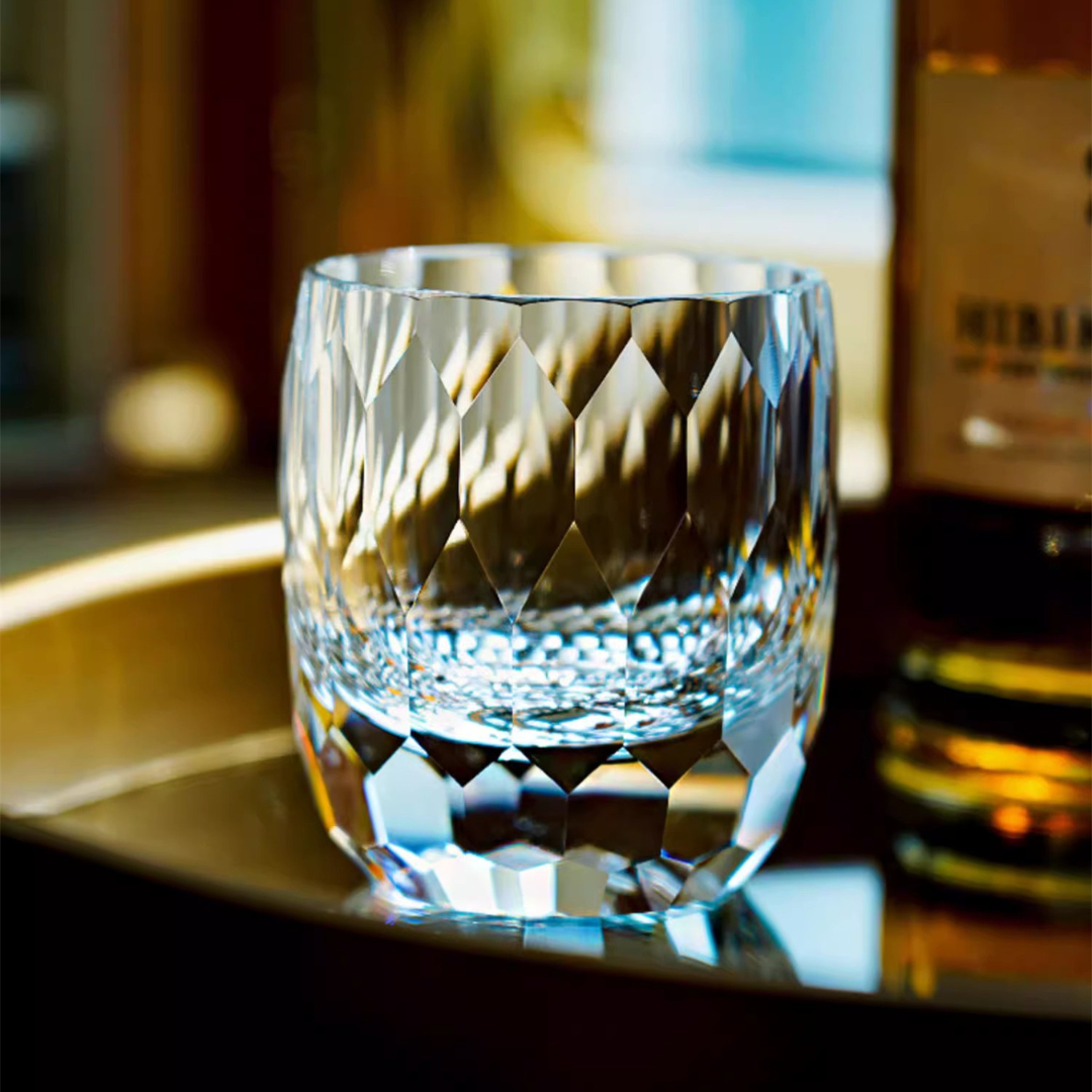Starlight Kiriko Diamond Whisky Glass - handcrafted crystal whisky glass featuring a stunning starlight-inspired design with intricate diamond-cut detailing paired with a fine whisky.