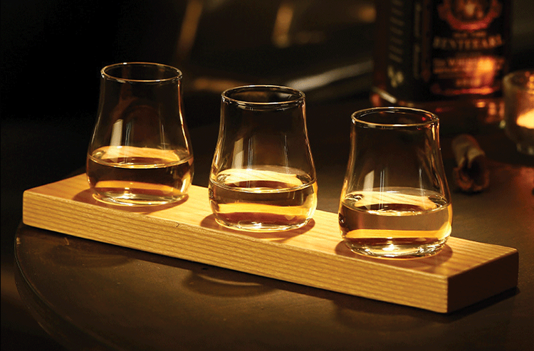 A stunning Japanese whisky glass set, featuring intricately crafted glassware, displayed elegantly to showcase its sleek and luxurious design, perfect for elevating any whisky-tasting experience.