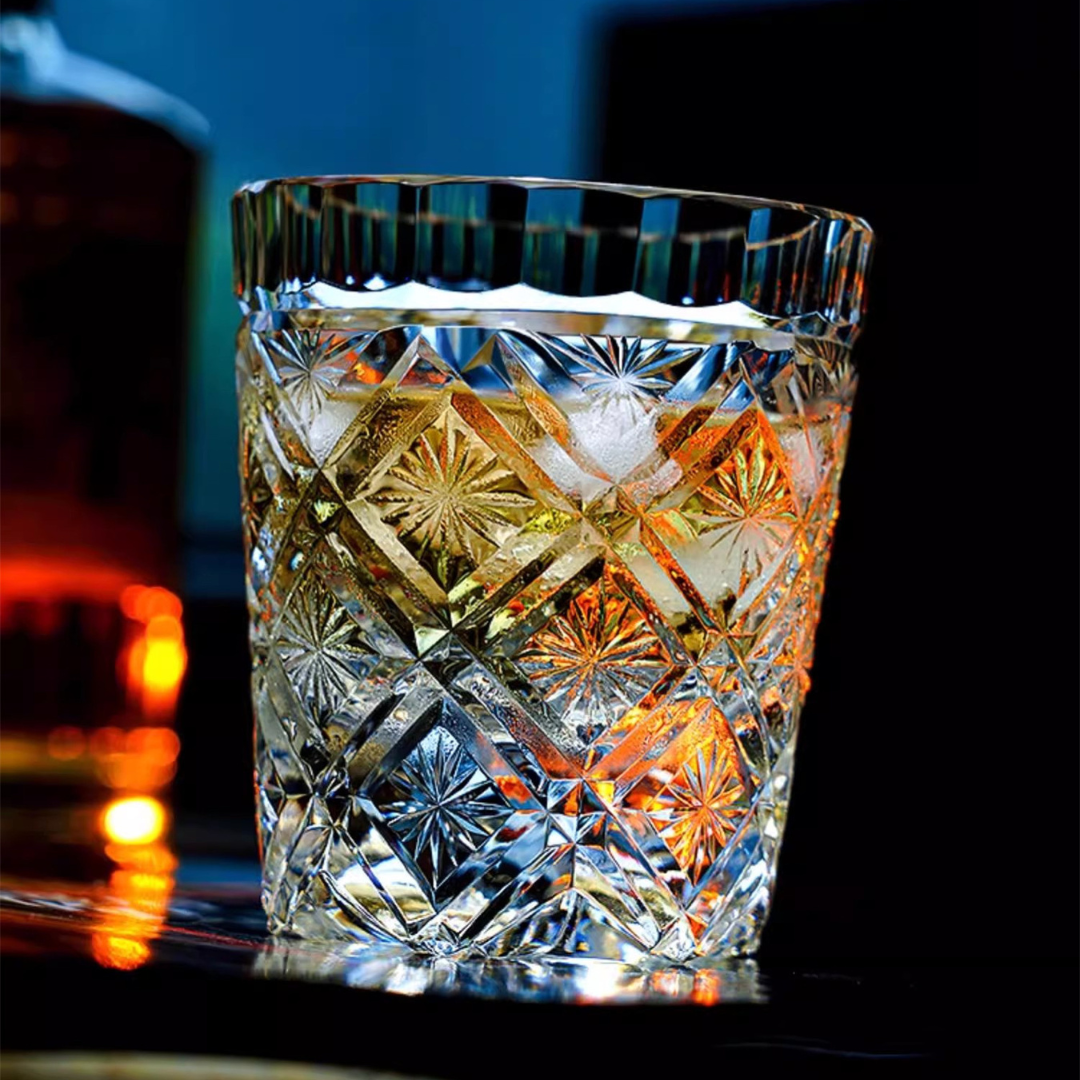 Handcrafted crystal whisky glass with intricate floral Kiriko cut design, exuding elegance and luxury for the perfect whisky-drinking experience.