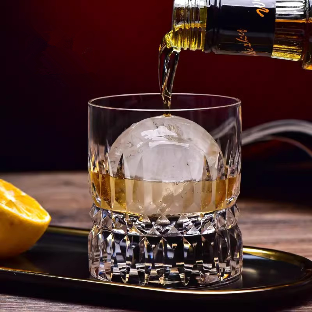 Pouring whisky in the Hand-Carved Artisan Whisky Glass