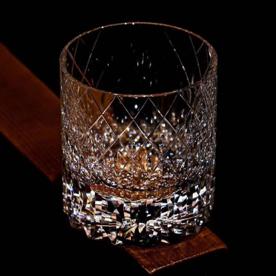 Starry Rain Crystal Whisky Glass front view with clear crystal, rain-inspired cuts and reflective base.