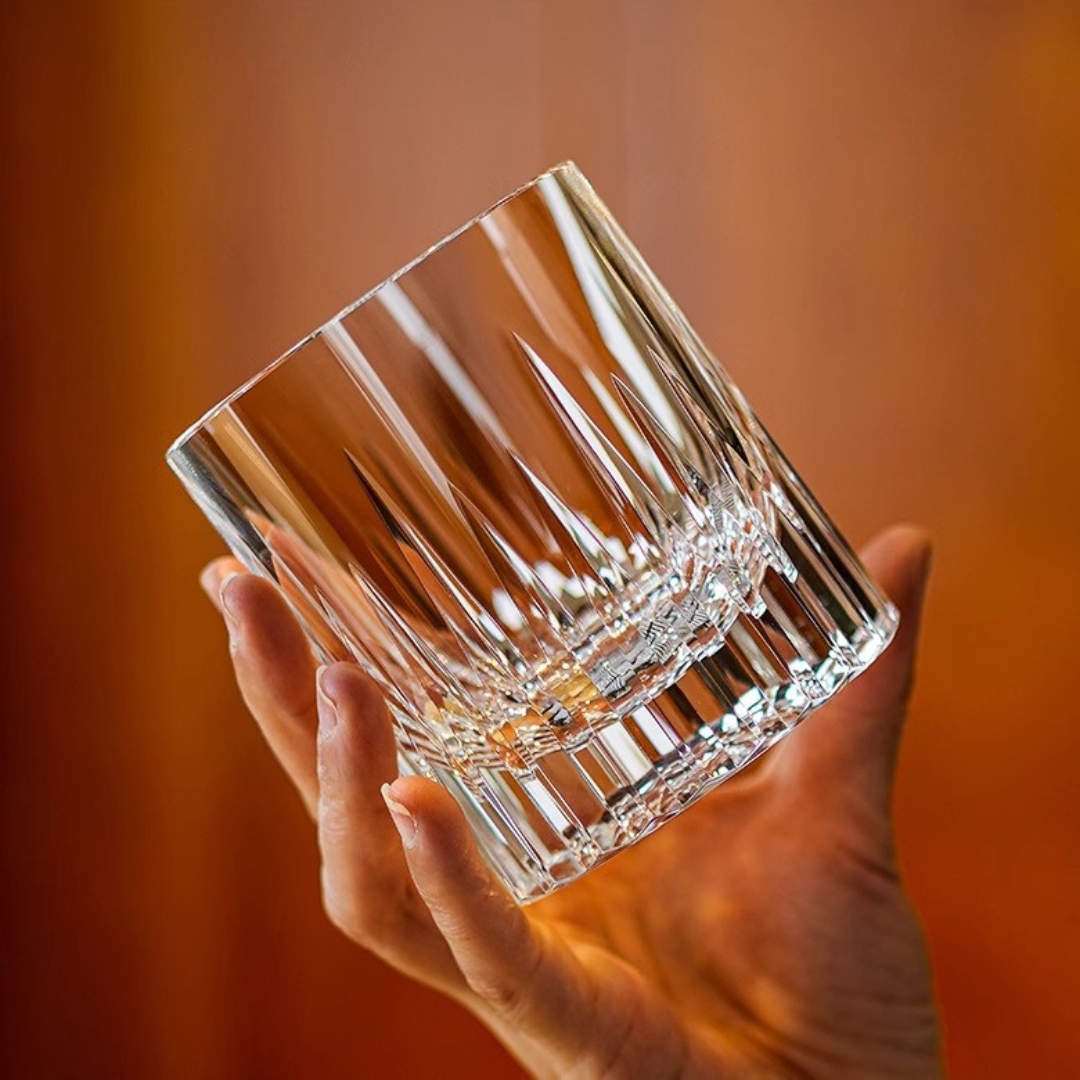 Hand holding our handcrafted Glacier Edo Crystal Whisky Glass made from premium crystal, featuring a classic glacier-inspired design for timeless elegance and a refined whisky-drinking experience.