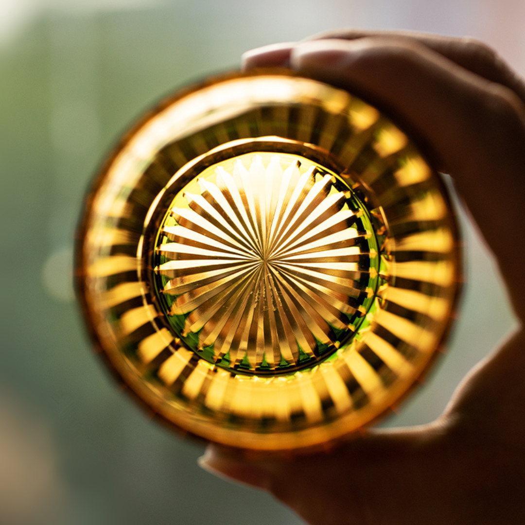 Jade Mount Fuji Glass viewed from below showing amber crystal base and radial cut detailing.