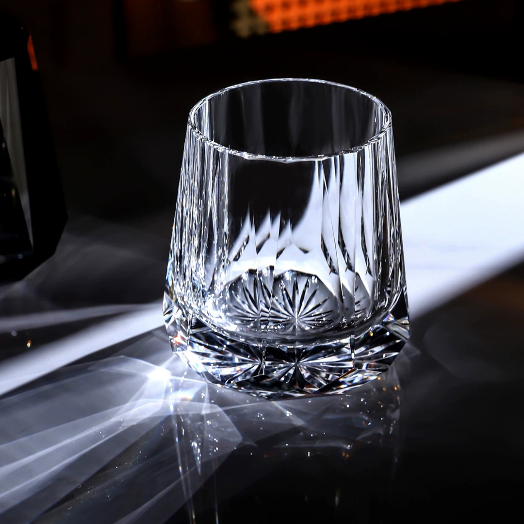 Diamond Cut Crystal Whisky Glass front view with clear crystal, vertical cuts and starburst base detail.