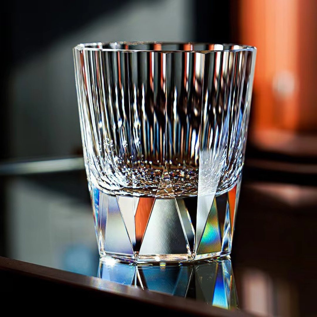 Moon Diamond Cut Crystal Whisky Glass with transparent K9 crystal, vertical cuts and reflective base.